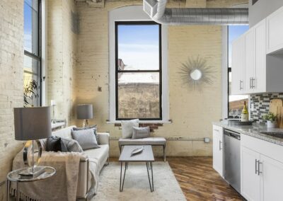 Open-concept living and kitchen area with a lot of natural lighting.